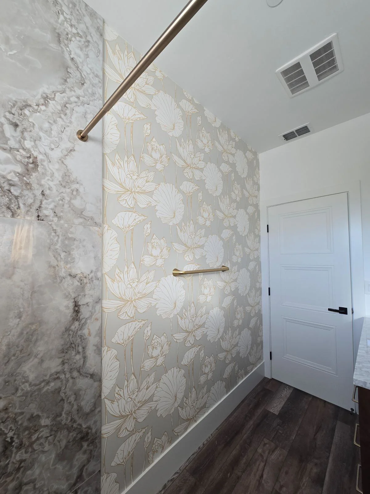 Commercial wallpaper installation in Austin hotel lobby